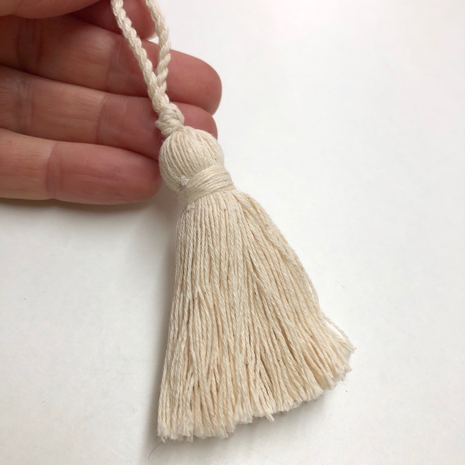 Cotton Tassel 60mm (100mm inc loop) 51 cream