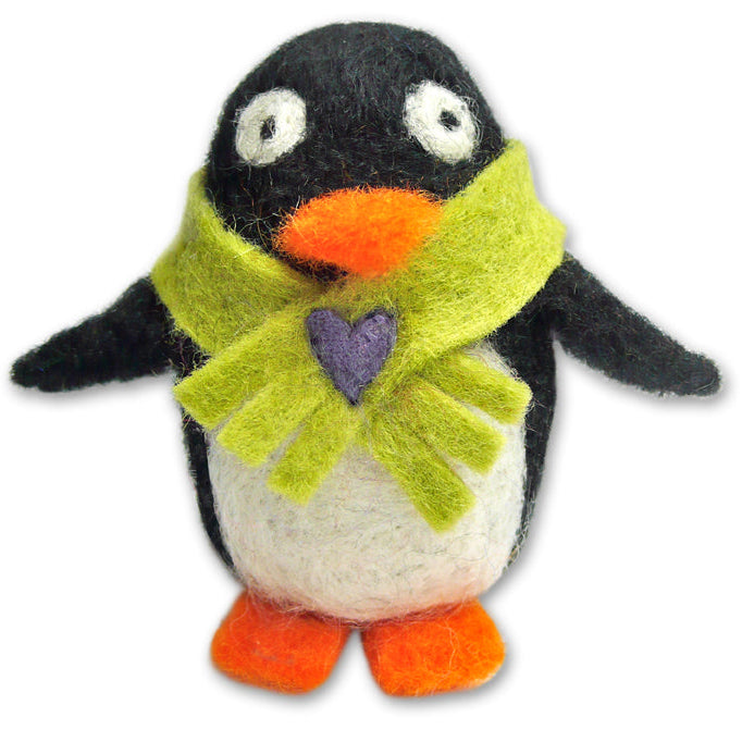 A needle-felted penguin with black, white, and orange coloring, wearing a green scarf with a purple heart decoration.