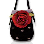 A felt bag with a large red rose design and a black background, featuring a handle.