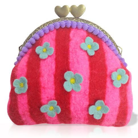 A pink and red striped felt coin clutch with a heart-shaped clasp, decorated with blue and purple flowers and a green netting trim.